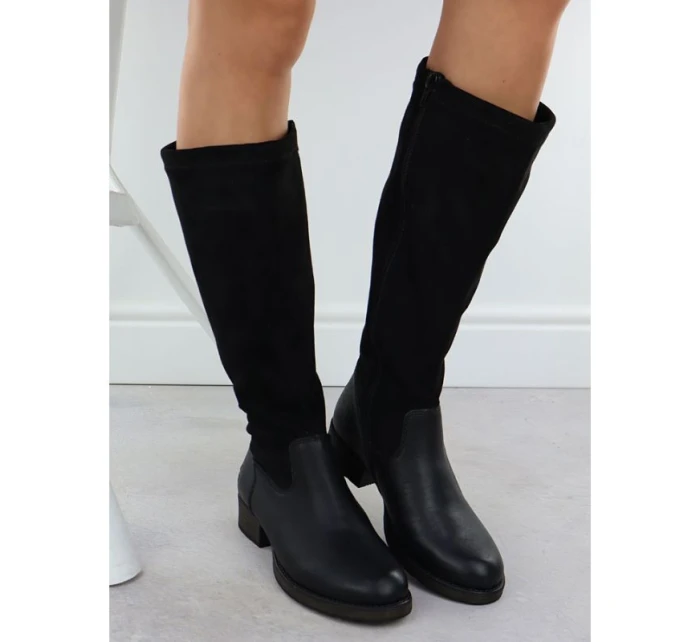 Dámské kožené boty na klínku zateplené černé Rieker 9551