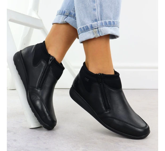 Dámské kožené nepromokavé pohodlné boty černé model 21905394 - Rieker