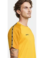 Craft Teamwear Squad Go Contrast Jersey M Pánské kontrastní sportovní tričko 82.2725 sweden yellow/golden Craft Teamwear Squad Go Contrast Jersey M Pánské kontrastní sportovní tričko 82.2725 sweden yellow/golden