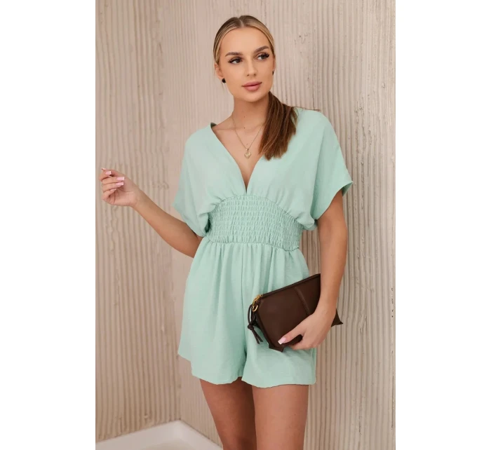 Kombinéza s volánky v pase tmavá máta