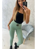 Pruhované legíny s vysokým pasem tmavě mátové