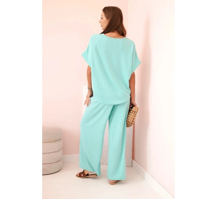 Dámský komplet z viskózy s ozdobným květem a širokými kalhotami - mátový Dámský komplet z viskózy s ozdobným květem a širokými kalhotami - mátový