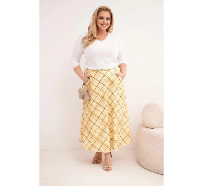 Dámská sukně Plus Size s širokým lemem v kostkovaném vzoru žlutá Dámská sukně Plus Size s širokým lemem v kostkovaném vzoru žlutá