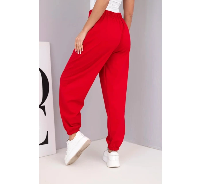 Dámské bavlněné kalhoty s vysokým pasem a ozdobným knoflíkem červené Dámské bavlněné kalhoty s vysokým pasem a ozdobným knoflíkem červené