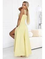 dlouhé šaty s rozparkem a výstřihem typu  žluté s třpytkami model 22092786 - numoco