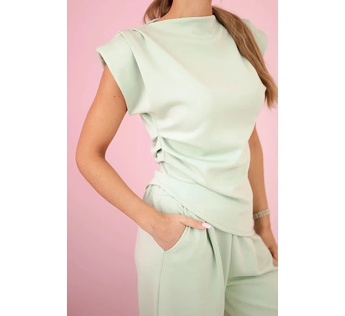 Komplet asymetrická halenka + kalhoty světle mátová