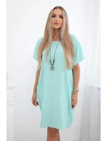 Šaty s kapsami a přívěskem světle mátová