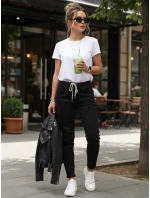 Černé dámské kalhoty FashionStreet s dírou UY2857 Černé dámské kalhoty FashionStreet s dírou UY2857