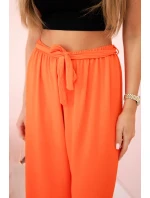 Kalhoty s širokým pasem tmavě oranžová