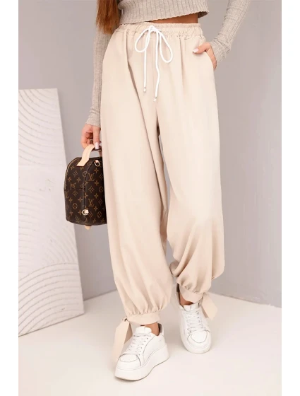 Dámské kalhoty s širokým nohavicí a vázáním dole béžové