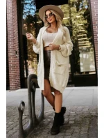 Módní oversize svetr s ozdobnou broží a kapsami béžový model 21322456 - numoco basic