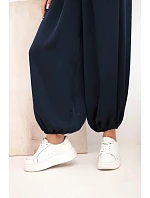 Dámské široké kalhoty s gumou v pase a vázáním typu model 22064417 - K-Fashion Dámské široké kalhoty s gumou v pase a vázáním typu model 22064417 - K-Fashion