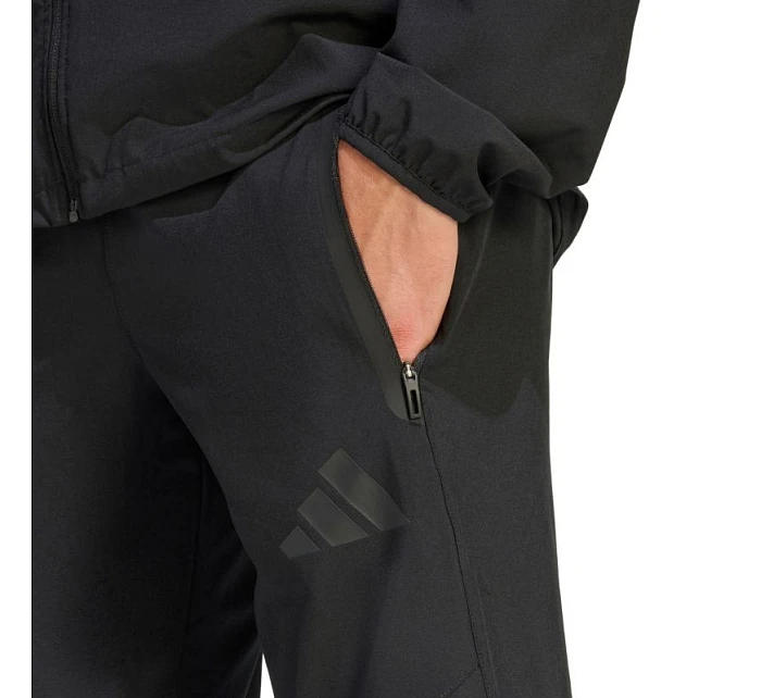 Pánské kalhoty Tiro 26 Travel Woven černé model 22062461 - ADIDAS Pánské kalhoty Tiro 26 Travel Woven černé model 22062461 - ADIDAS