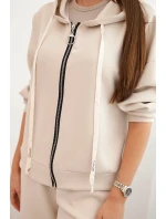 Dámský komplet máslový s širokými nohavicemi a mikinou na zip béžový Dámský komplet máslový s širokými nohavicemi a mikinou na zip béžový