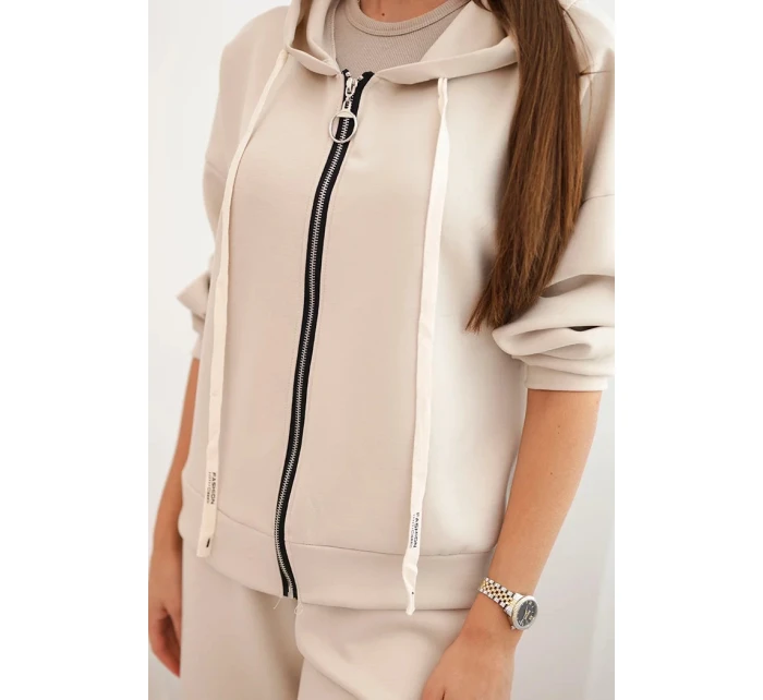 Dámský komplet máslový s širokými nohavicemi a mikinou na zip béžový Dámský komplet máslový s širokými nohavicemi a mikinou na zip béžový
