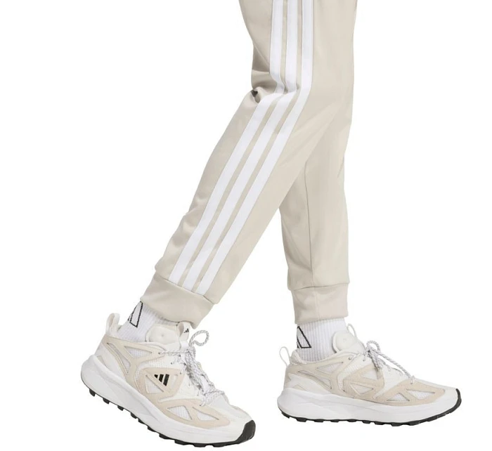 Pánské kalhoty 3Stripes Tricot Regular Tapered béžové model 22063052 - ADIDAS Pánské kalhoty 3Stripes Tricot Regular Tapered béžové model 22063052 - ADIDAS