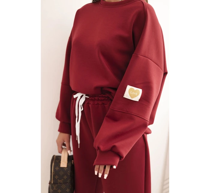 Dámská souprava máslová s volnou mikinou a kalhotami s nápisem LOVE bordová Dámská souprava máslová s volnou mikinou a kalhotami s nápisem LOVE bordová