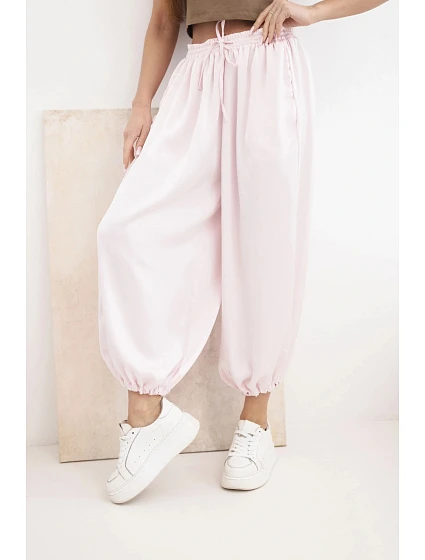 Dámské široké kalhoty s gumou v pase a šňůrkou ve stylu model 22064407 bonbónově růžová - K-Fashion