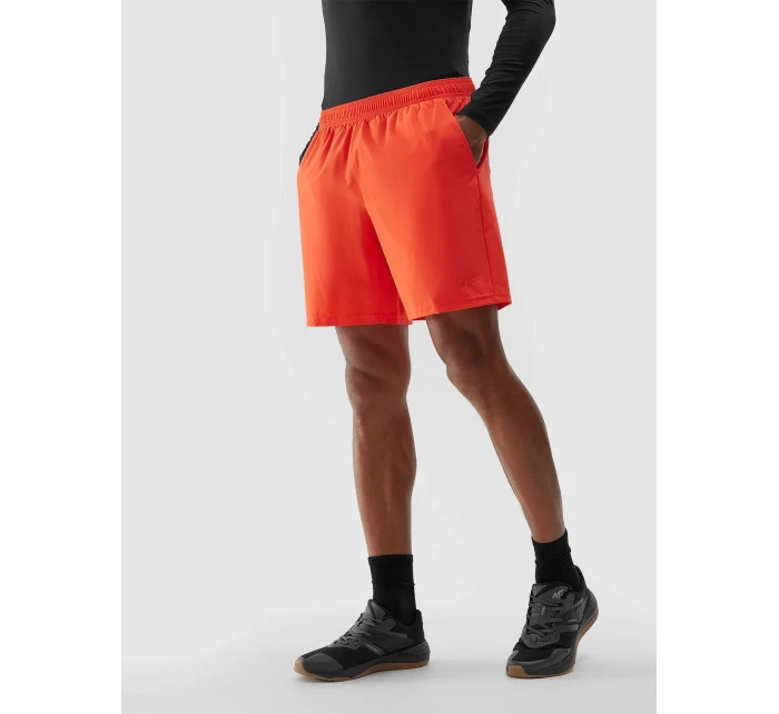 Pánské sportovní šortky z recyklovaných materiálů 4F - oranžové Pánské sportovní šortky z recyklovaných materiálů 4F - oranžové