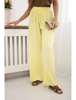 Mušelínové kalhoty se širokou nohavicí  žlutý