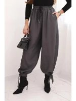 Dámské kalhoty s širokou nohavicí a zavazováním dole grafitové Dámské kalhoty s širokou nohavicí a zavazováním dole grafitové