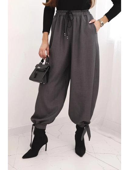 Dámské kalhoty s širokou nohavicí a zavazováním dole grafitové Dámské kalhoty s širokou nohavicí a zavazováním dole grafitové