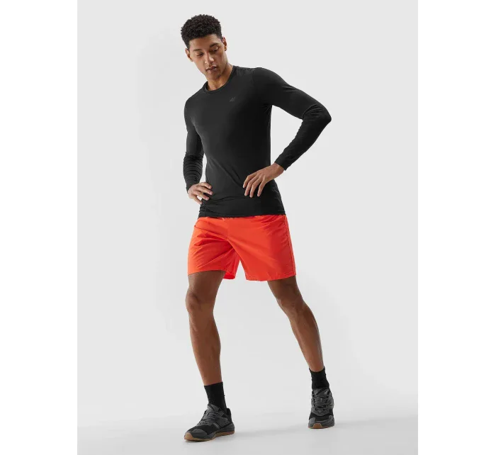 Pánské sportovní šortky z recyklovaných materiálů 4F - oranžové Pánské sportovní šortky z recyklovaných materiálů 4F - oranžové