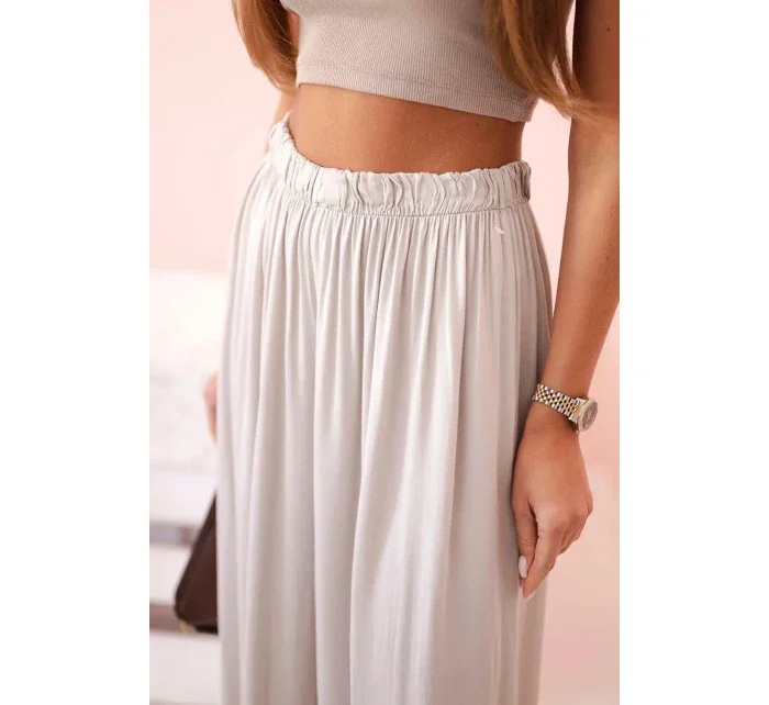Široké dámské kalhoty s elastickým pasem tmavě béžová