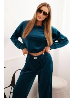 Dámská souprava z veluru s širokými nohavicemi a mikinou s kapucí model 21232345 - K-Fashion Dámská souprava z veluru s širokými nohavicemi a mikinou s kapucí model 21232345 - K-Fashion