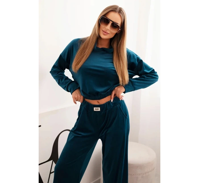 Dámská souprava z veluru s širokými nohavicemi a mikinou s kapucí model 21232345 - K-Fashion Dámská souprava z veluru s širokými nohavicemi a mikinou s kapucí model 21232345 - K-Fashion
