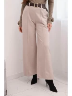 Dámské elegantní kalhoty s páskem a širokými nohavicemi béžové