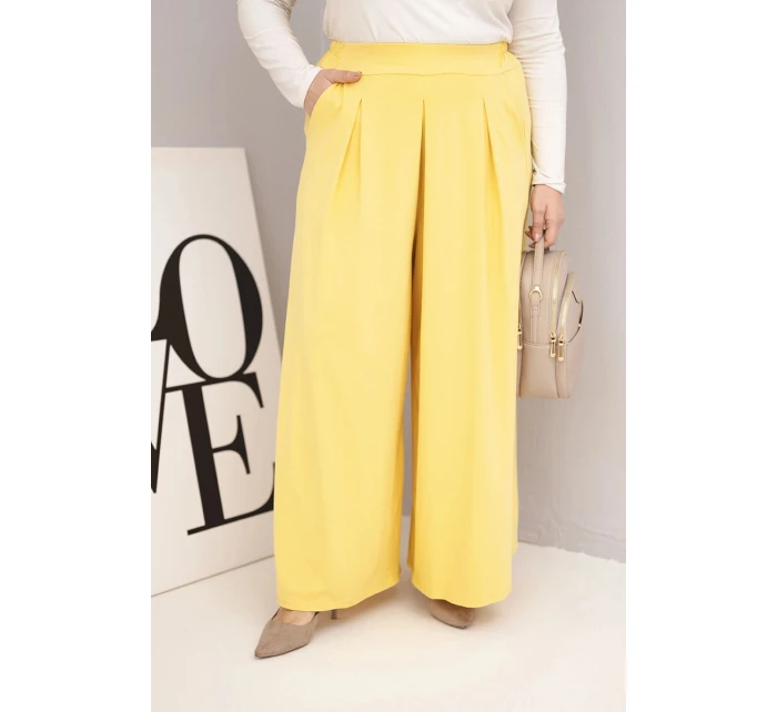 Dámské bavlněné kalhoty Plus Size s širokým střihem a volným střihem žluté Dámské bavlněné kalhoty Plus Size s širokým střihem a volným střihem žluté