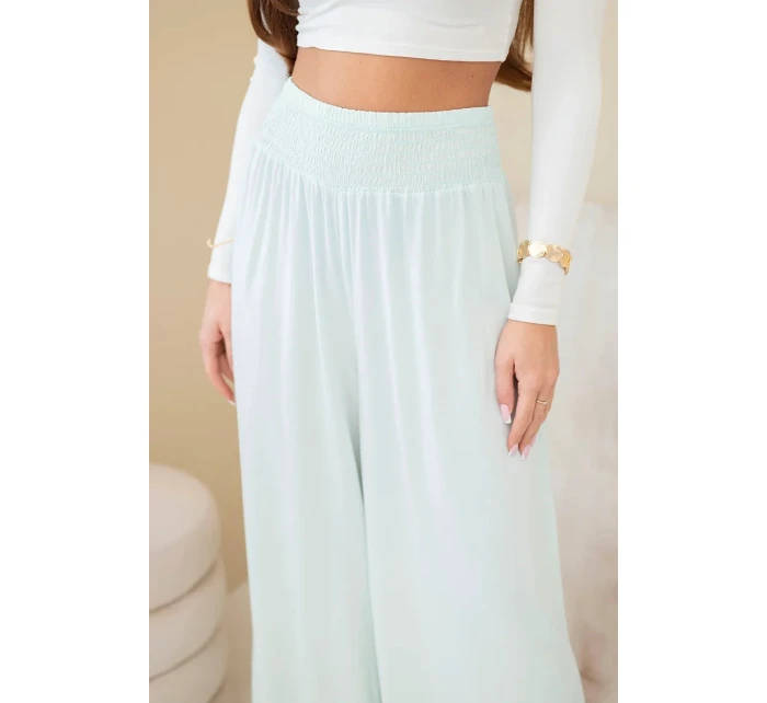 Dámské viskózové kalhoty s elastickým pasem mátové Dámské viskózové kalhoty s elastickým pasem mátové