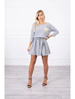 Šaty s flitrovou kapsou šedé