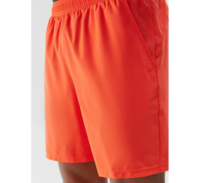 Pánské sportovní šortky z recyklovaných materiálů 4F - oranžové Pánské sportovní šortky z recyklovaných materiálů 4F - oranžové