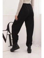 Elegantní dámské kalhoty s vysokým pasem a vázáním v pase černé Elegantní dámské kalhoty s vysokým pasem a vázáním v pase černé