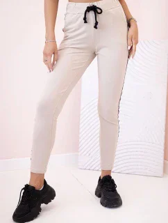 Dámské teplákové kalhoty s model 21154159 a šňůrkou v pase béžové - K-Fashion