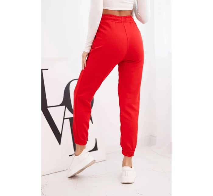 Dámské bavlněné kalhoty s gumou v pase červené Dámské bavlněné kalhoty s gumou v pase červené