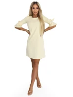 Dámské trapézové šaty s vázáním na rukávech pastelově žluté model 22022940 - numoco