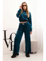 Dámská souprava z veluru s širokými nohavicemi a mikinou s kapucí model 21232345 - K-Fashion Dámská souprava z veluru s širokými nohavicemi a mikinou s kapucí model 21232345 - K-Fashion