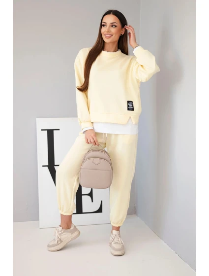 Dámská souprava s volná mikina a tepláky žlutý model 21808625 - K-Fashion Dámská souprava s volná mikina a tepláky žlutý model 21808625 - K-Fashion