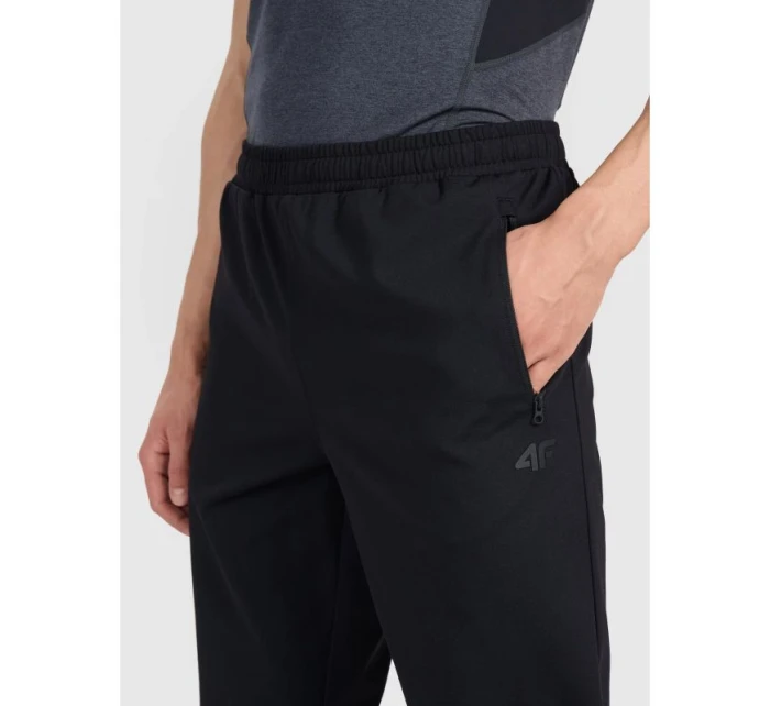 Pánské rychleschnoucí tréninkové kalhoty model 21437262 - 4F Pánské rychleschnoucí tréninkové kalhoty model 21437262 - 4F