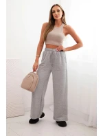 Dámské bavlněné cargo kalhoty s kapsami a řetízkem béžové