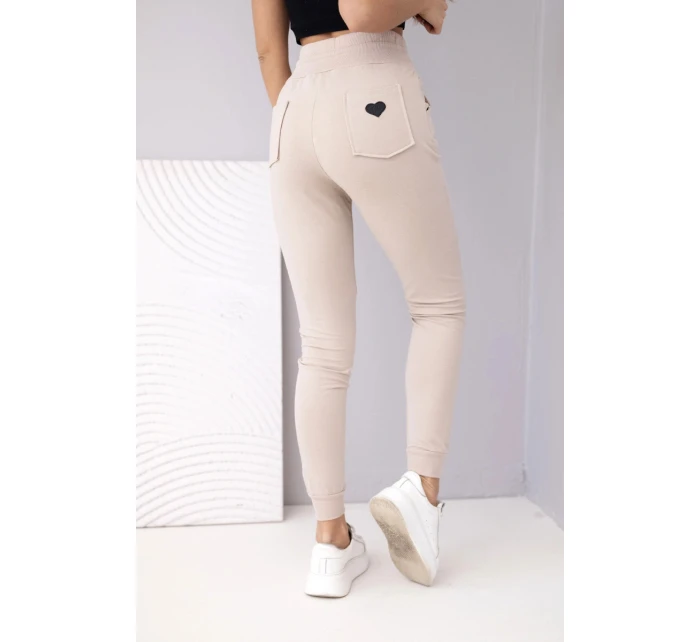 Dámské teplákové kalhoty s vysokým pasem a šňůrkou béžové