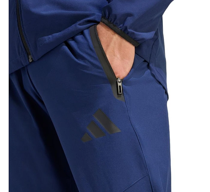 Pánské kalhoty Tiro 26 Travel Woven navy blue model 22062501 - ADIDAS