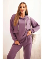 Komplet dámský máslový mikina s kapucí a kalhoty s páskem fialový Komplet dámský máslový mikina s kapucí a kalhoty s páskem fialový
