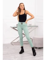 Pruhované legíny s vysokým pasem tmavě mátové