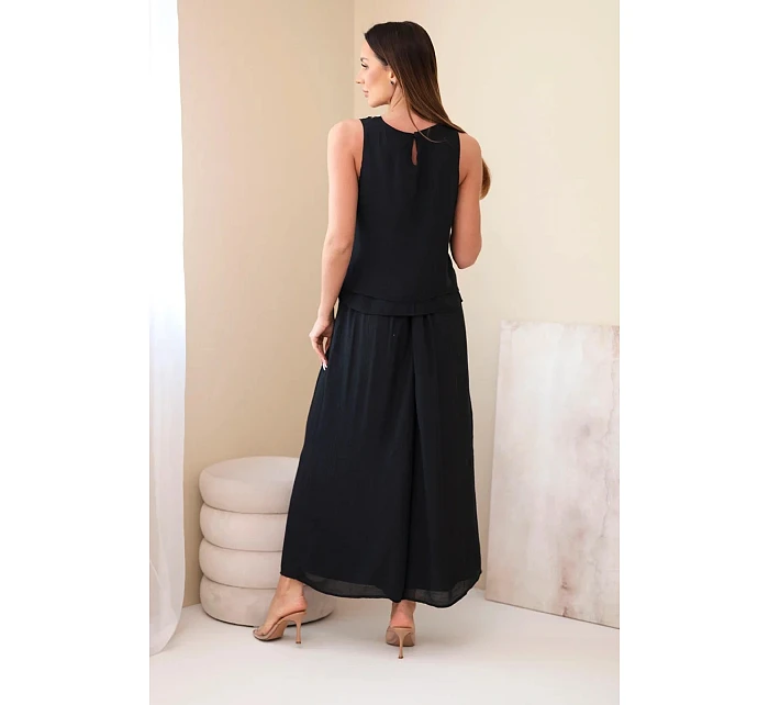 Dámský komplet z viskózy s topem bez rukávů a širokými kalhotami s ozdobným zakončením černý Dámský komplet z viskózy s topem bez rukávů a širokými kalhotami s ozdobným zakončením černý