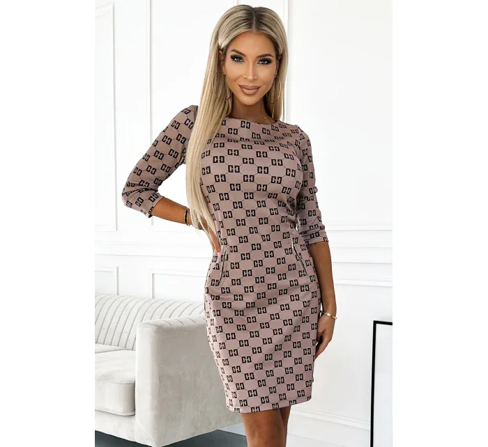 Béžové dámské šaty s černým vzorem a se zlatými zipy model 18910592 - numoco Béžové dámské šaty s černým vzorem a se zlatými zipy model 18910592 - numoco