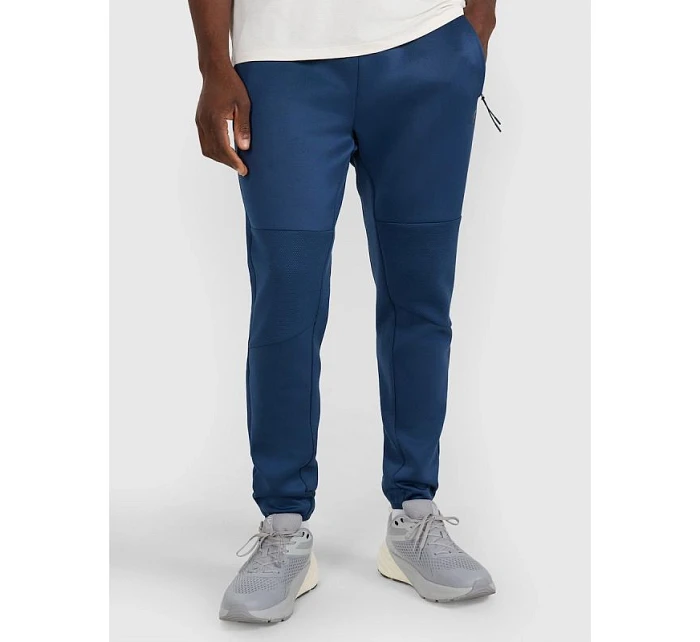 Pánské rychleschnoucí tréninkové kalhoty model 22071382 - 4F Pánské rychleschnoucí tréninkové kalhoty model 22071382 - 4F